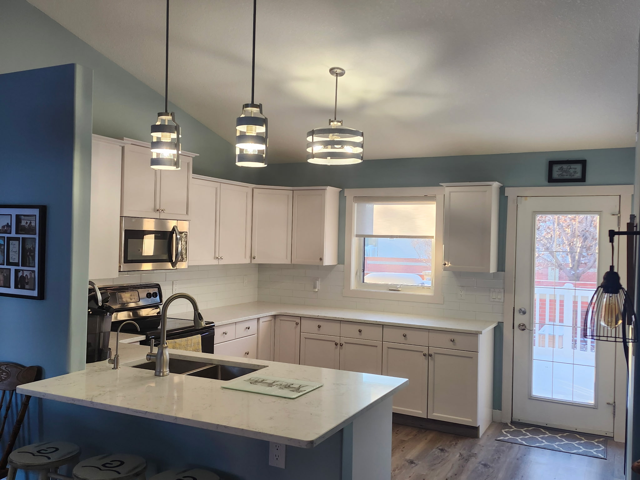 Finished kitchen with pendant lights
